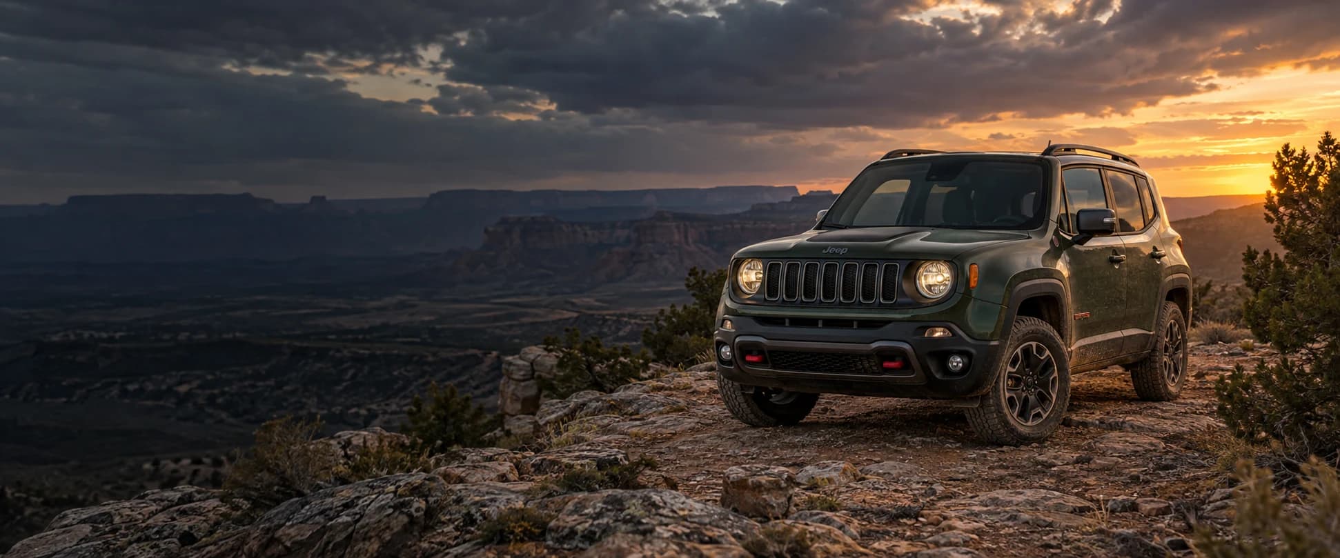 Jeep Renegade on a rugged desert trail at sunset